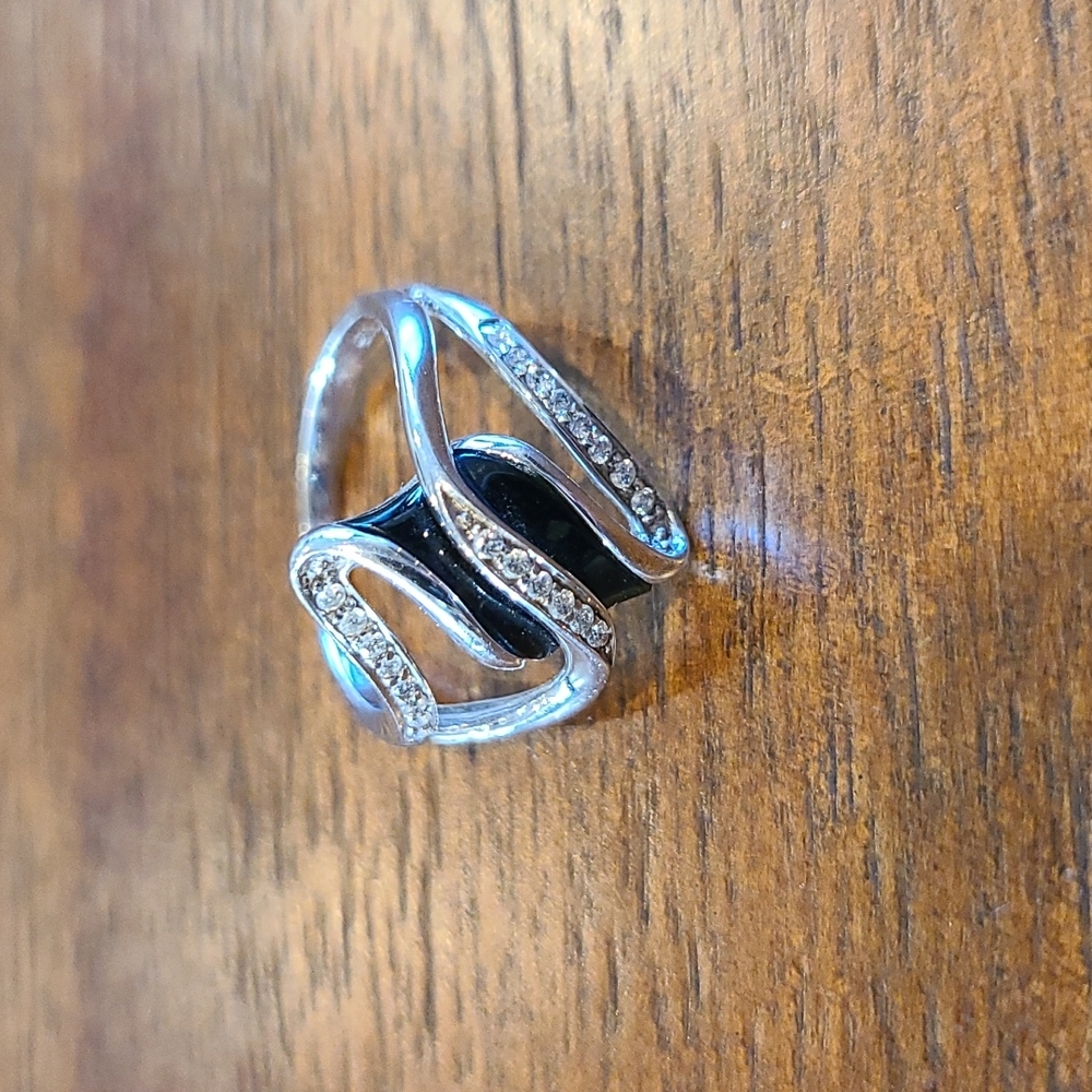 Black gem wrapped in diamonds size 7.5